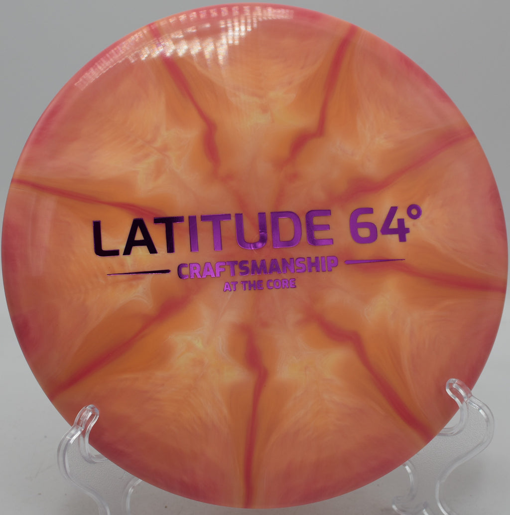 Latitude 64° Claymore Gold-Ice Burst Craftsmanship disc gliding long at Winthrop Gold Disc Golf Course in Rock Hill, South Carolina.
