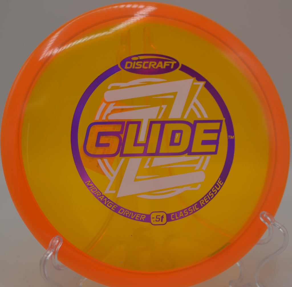 Discraft Z Glide fairway driver shaping a wooded turnover at Tyler State Park Disc Golf Course in Newtown, Pennsylvania.