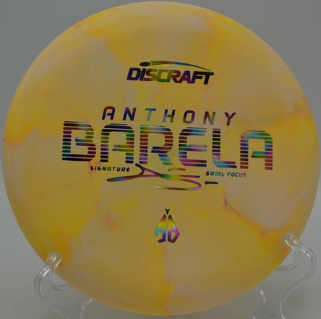 Discraft CT Swirl Focus Anthony Barela putter on a hyzer release at Holler in the Hills Disc Golf Course in Brownsville, Kentucky.