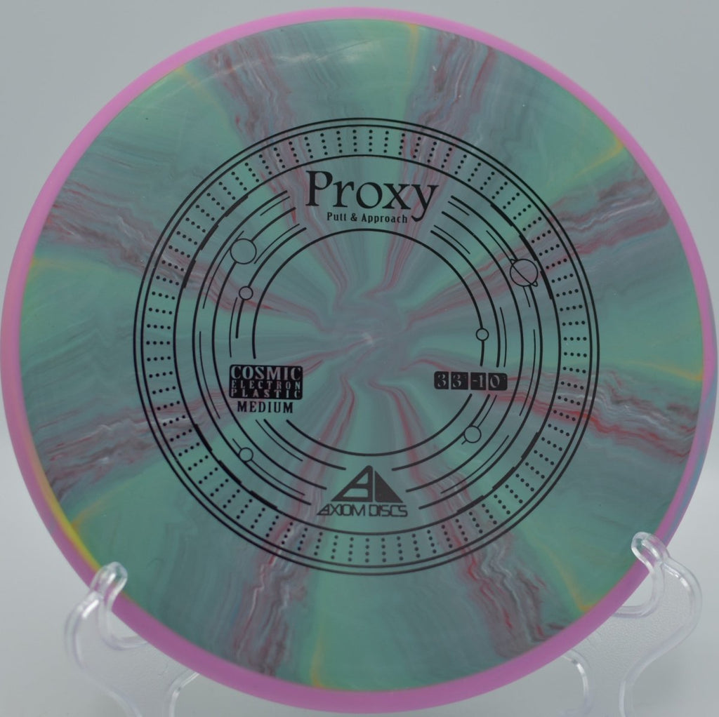 Axiom Cosmic Electron Proxy putter flying dead straight on a confident circle-one putt at Fort Steilacoom Disc Golf Course in Lakewood, Washington