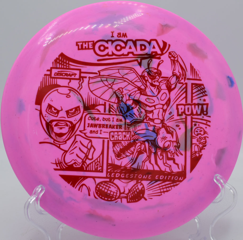 Jawbreaker Lite Cicada flying effortlessly through a wooded tunnel shot at Rocklin Disc Golf Course in Rocklin, California, showing off its controllable understability and lightweight release.