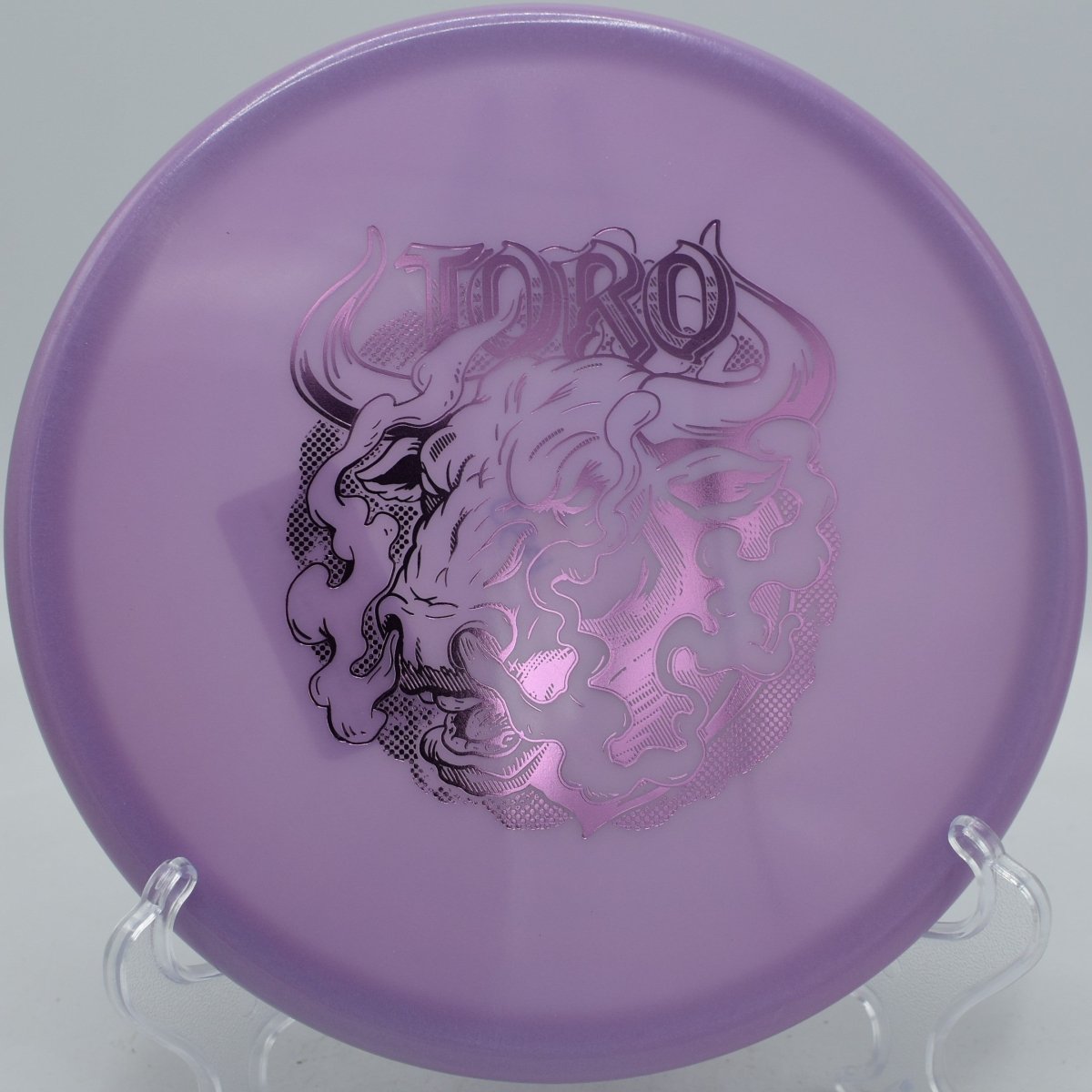 Classic Glow Champion Toro (Artist's Corner) forehand utility disc popular in Florida courses