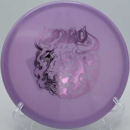 Classic Glow Champion Toro (Artist's Corner) forehand utility disc popular in Florida courses