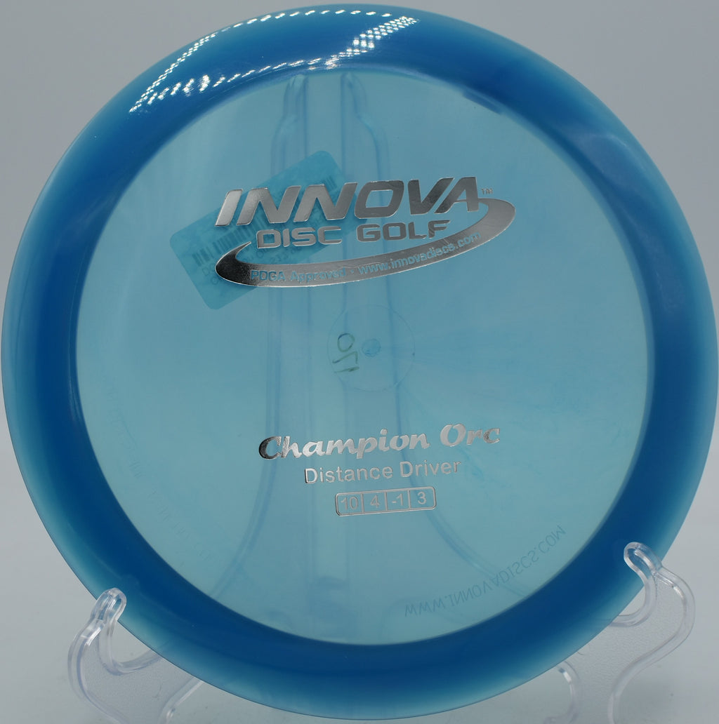 Champion Orc flying on a powerful forehand flex line at Hornets Nest Disc Golf Course in Charlotte, NC