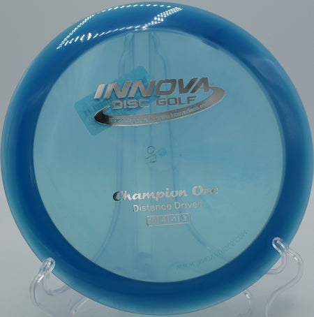 Champion Orc flying on a powerful forehand flex line at Hornets Nest Disc Golf Course in Charlotte, NC