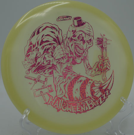 Halloween 2025 Single Stamped Mega Glo Buzzz glowing in flight at Sunset Park Disc Golf Course in Las Vegas, Nevada.