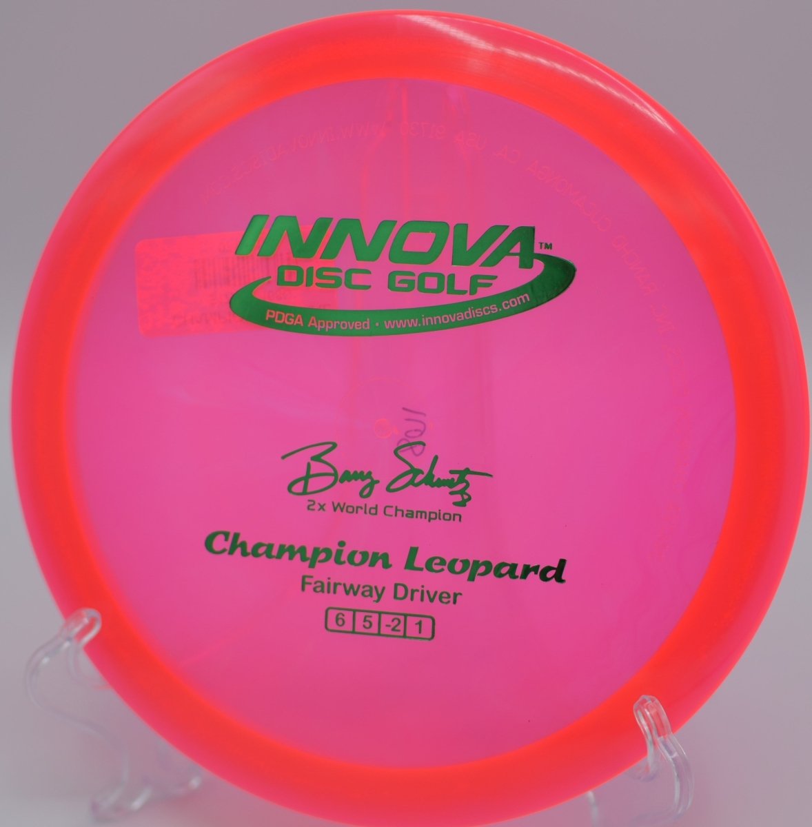 Champion Leopard fairway driver gliding straight down a tight tunnel shot at Hidden Ridge Disc Golf Course in West Milford, New Jersey