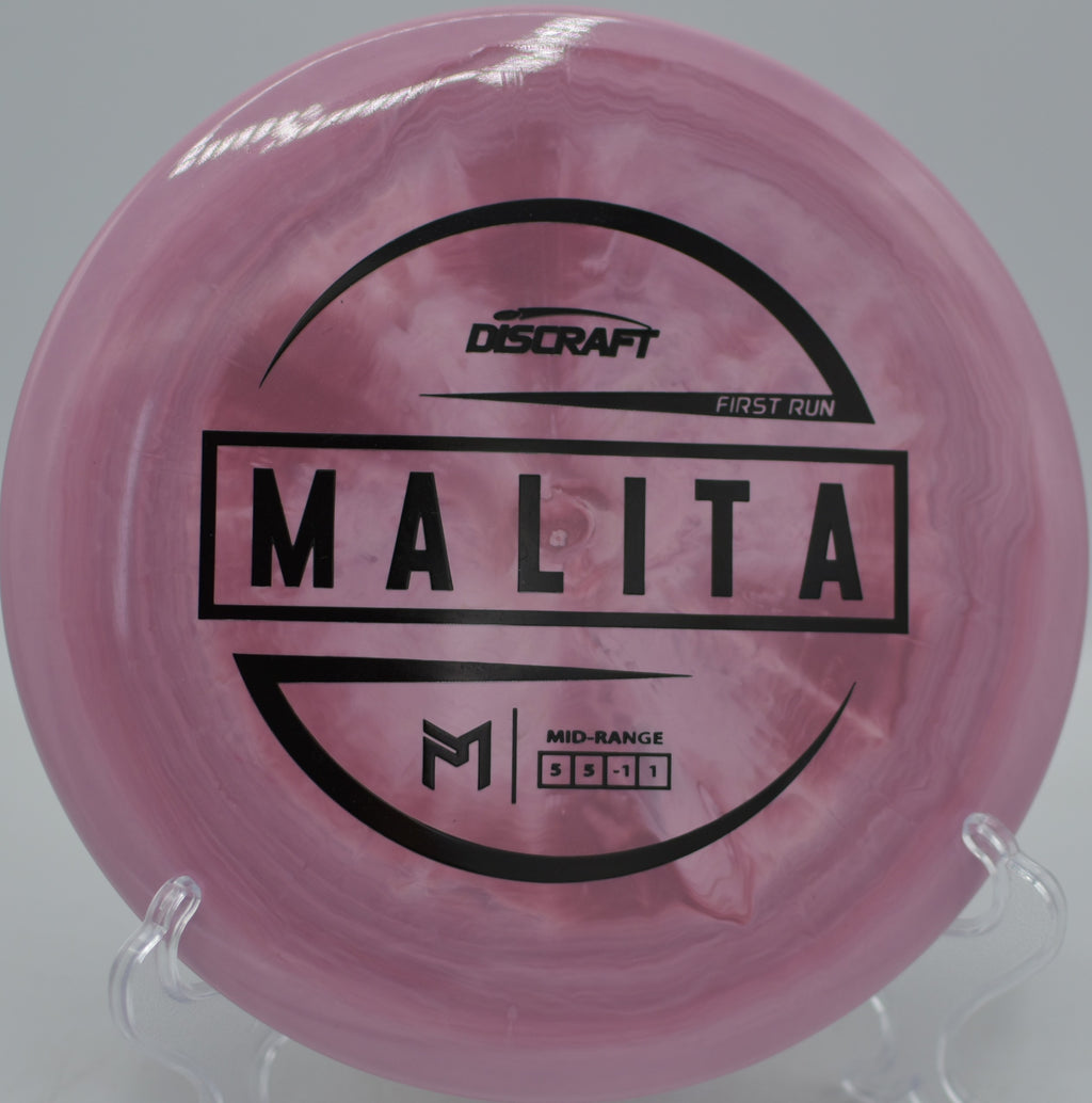 Discraft First Run ESP Malita gliding straight down the fairway at Maple Hill Disc Golf Course in Leicester, Massachusetts.