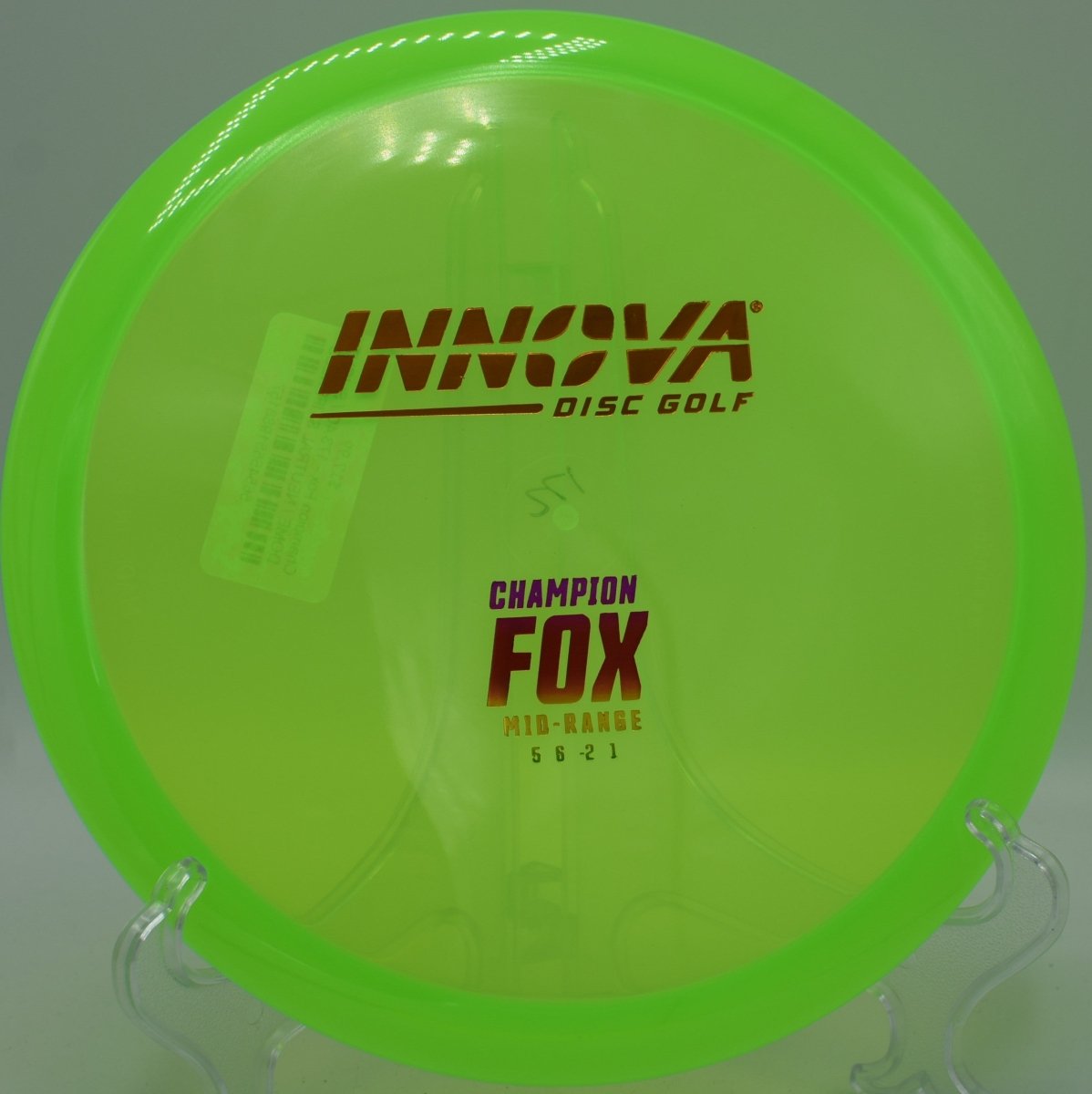 Champion Fox midrange staged for a straight tunnel shot at Searight Park Disc Golf Course in Austin, Texas