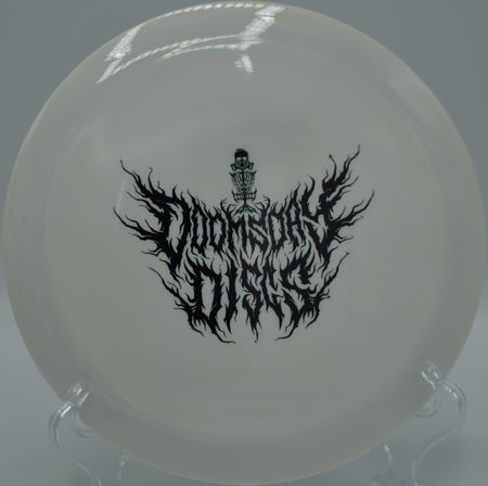 Doomsday Cataclysm streaking down a wooded tunnel at Bear Cave DGC in Buchanan, MI, holding a neutral high-speed turn before bending out cleanly.