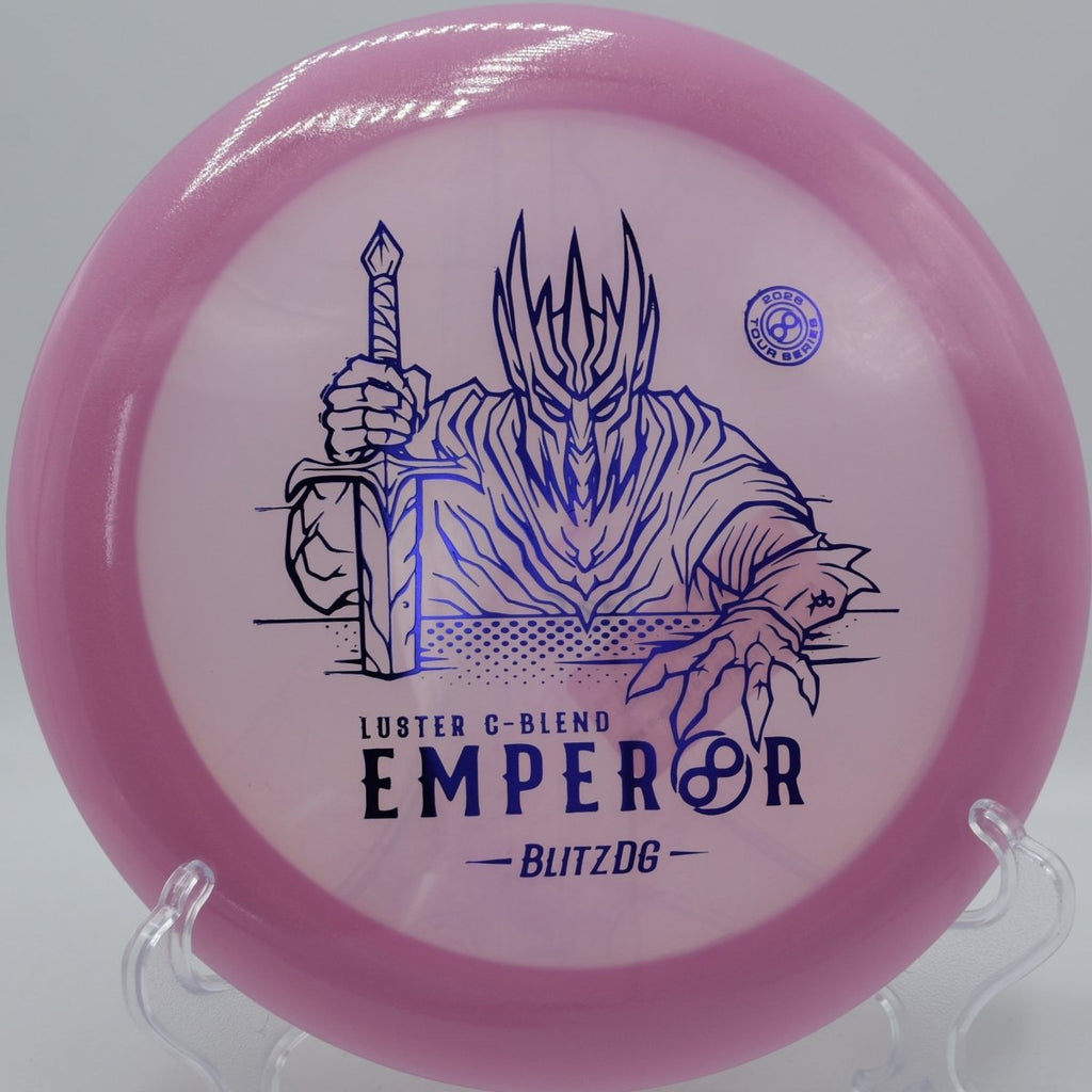 Luster C-Blend Emperor driver resting near basket after a long flex shot at Harmon Hills Disc Golf Course in Fall Branch, Tennessee