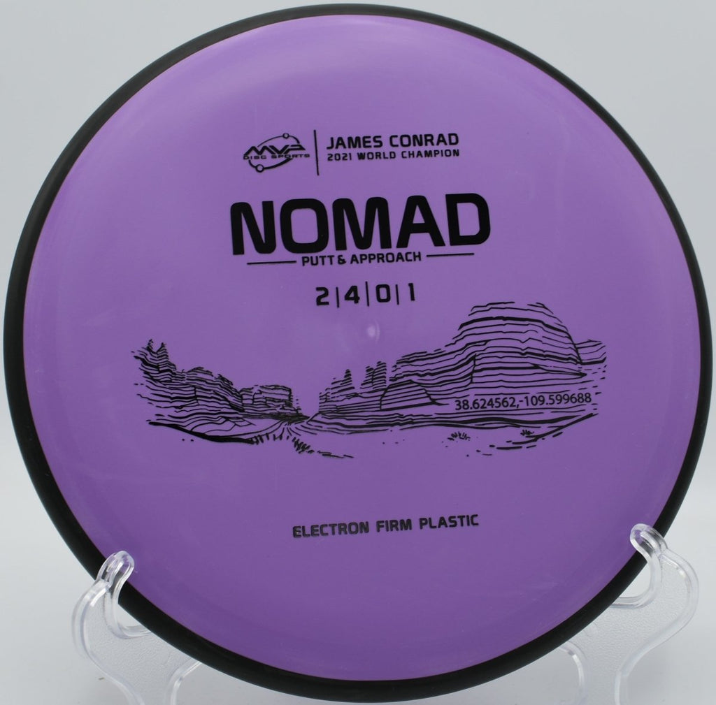 Electron Firm Nomad disc golf putter beside the cage after a straight approach shot at Roosevelt Park Disc Golf Course in Rapid City, South Dakota