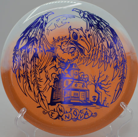 Halloween Duo Roc3 gliding through a wooded fairway gap at Rollin Ridge Disc Golf Course in Reedsville, Wisconsin.