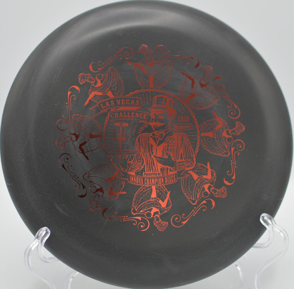 Black DX Aviar making a soft landing on the green at Lake Chabot Disc Golf Course in Castro Valley, California.