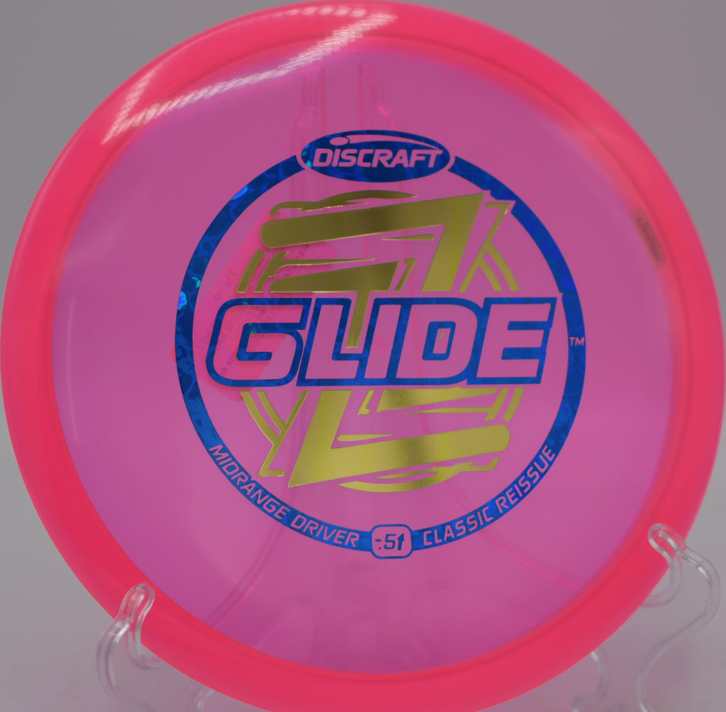 Reissued Z Glide parked under the basket on a smooth fairway drive at Milo McIver Disc Golf Course in Estacada, Oregon.