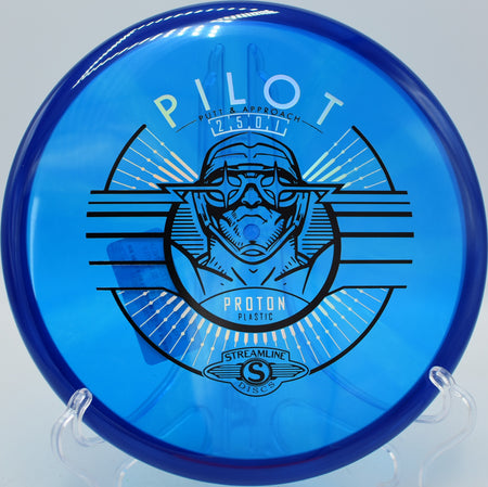 Streamline Proton Pilot on a glidey approach toward the chains at Water Works Park Disc Golf Course in Kansas City, Missouri.
