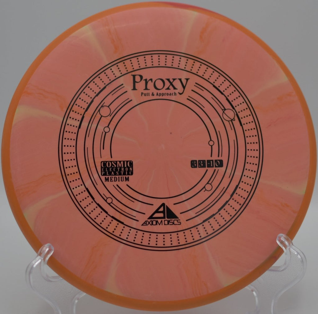 Cosmic Electron Proxy putter from Axiom gliding smoothly on a touch approach shot at Roy G Guerrero Disc Golf Course in Austin, Texas