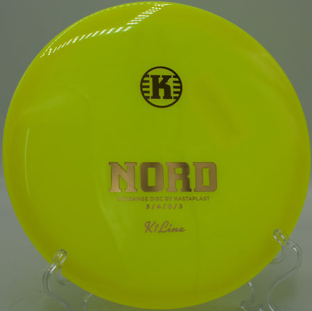K1 Nord Kastaplast fairway driver gliding with accuracy through wooded lines at Idlewild Disc Golf Course in Burlington, Kentucky.
