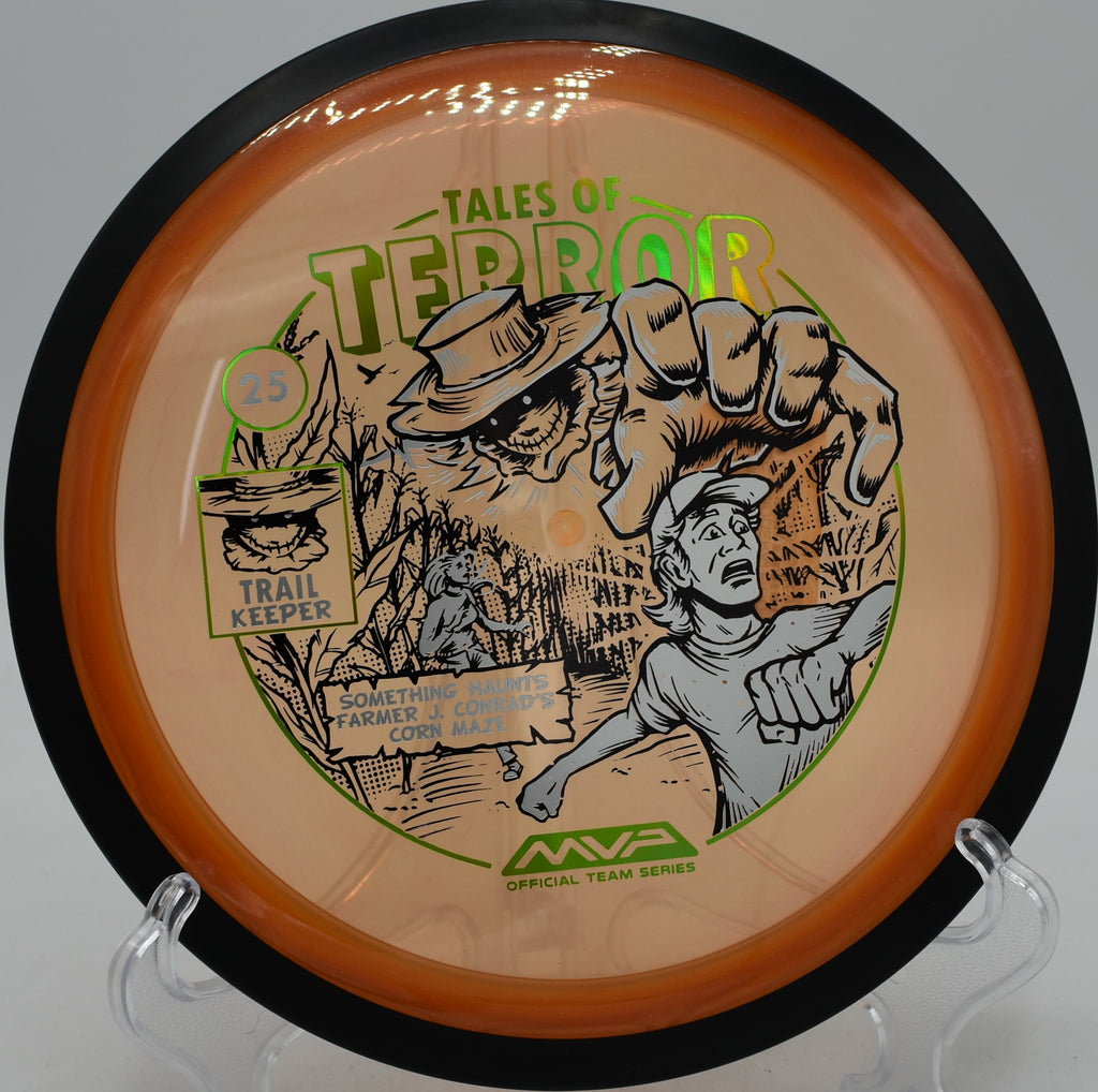 MVP Proton Trail Halloween stamp gliding through tunnel shot at Idlewild Disc Golf Course, Burlington, KY.