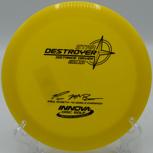 Innova Star Destroyer fading perfectly toward the basket on Hole 3 at Water Works Park Disc Golf Course, Kansas City, Missouri.
