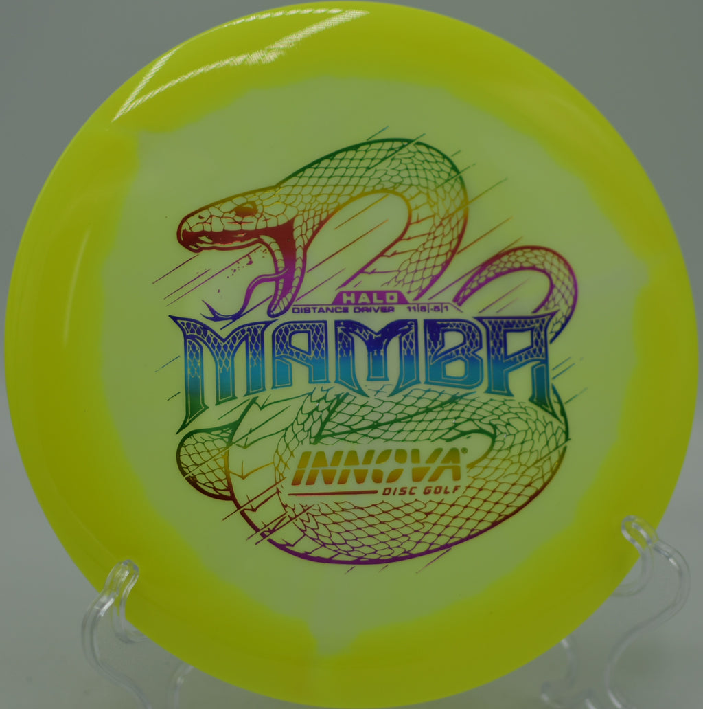 Innova Halo Star Mamba gliding past trees on a tunnel shot at Idlewild Disc Golf Course in Burlington, Kentucky.