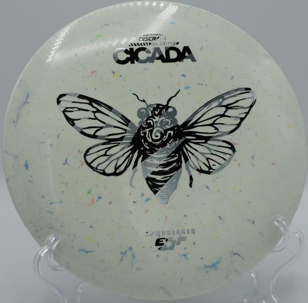 Close-up of a Jawbreaker ESP Cicada on the teepad at Eagles Crossing in Hawk Point, Missouri, featuring signature Discraft swirl and clean profile.

