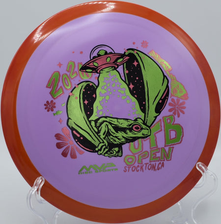 Axiom Delirium Fission OTB Open edition driver photographed near fairway tunnel at Hornets Nest Disc Golf Course in Charlotte, North Carolina