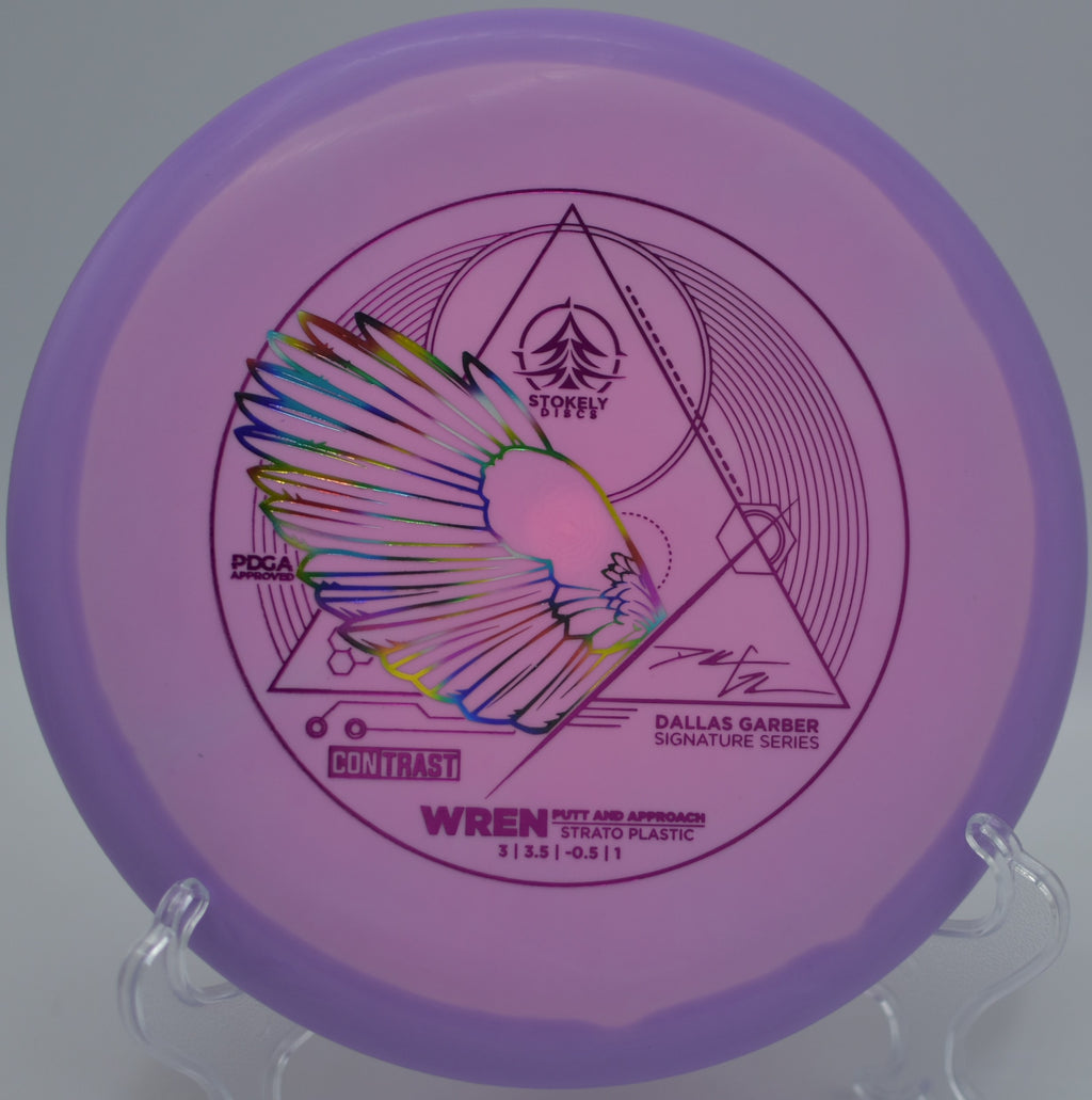 Player gripping the Contrast Strato Wren – Dallas Garber Edition before a confident circle putt at Two Rivers Disc Golf Course in Nashville, Tennessee.