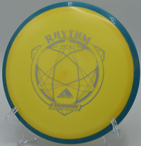 A disc golfer throwing a turnover shot with a Fission Rhythm at DeLaveaga Disc Golf Course in Santa Cruz, California.