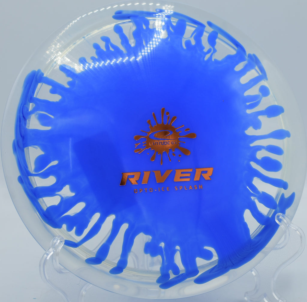 River in Opto-Ice Splash plastic resting beside a pin at Water Works Park in Kansas City, Missouri, trusted for glide-heavy fairway drives and shaping turnovers.

