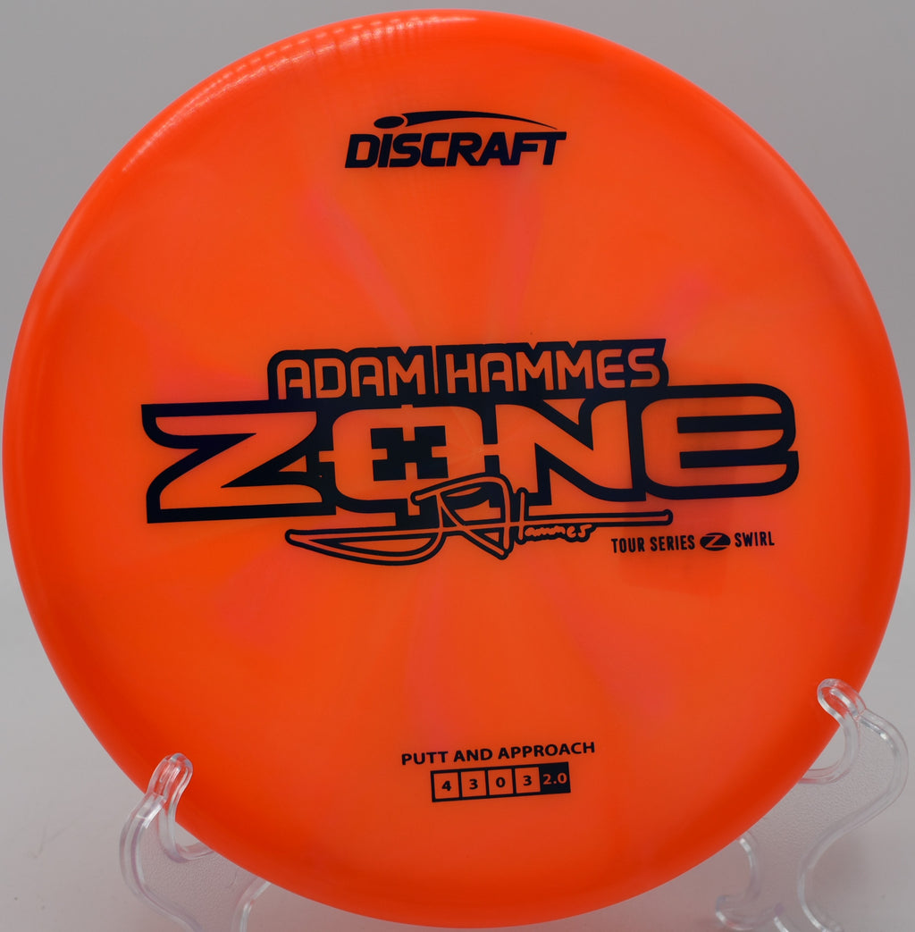 Overhead shot of Z Swirl Zone flying a tight tunnel at Iron Hill Disc Golf Course in Newark, Delaware.

