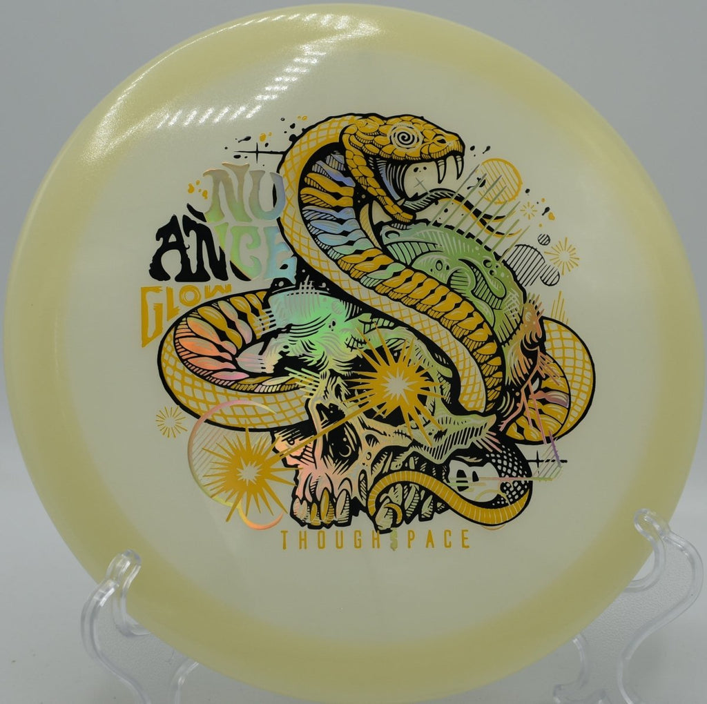 Thought Space Athletics Nuance fairway driver carving a smooth hyzer flip at Rolling Pines Disc Golf Course in Wilkesboro, North Carolina
