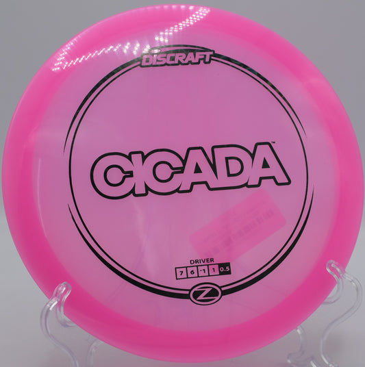 Cicada in Z plastic flipping up and drifting right at Idlewild Disc Golf Course in Burlington, Kentucky.

