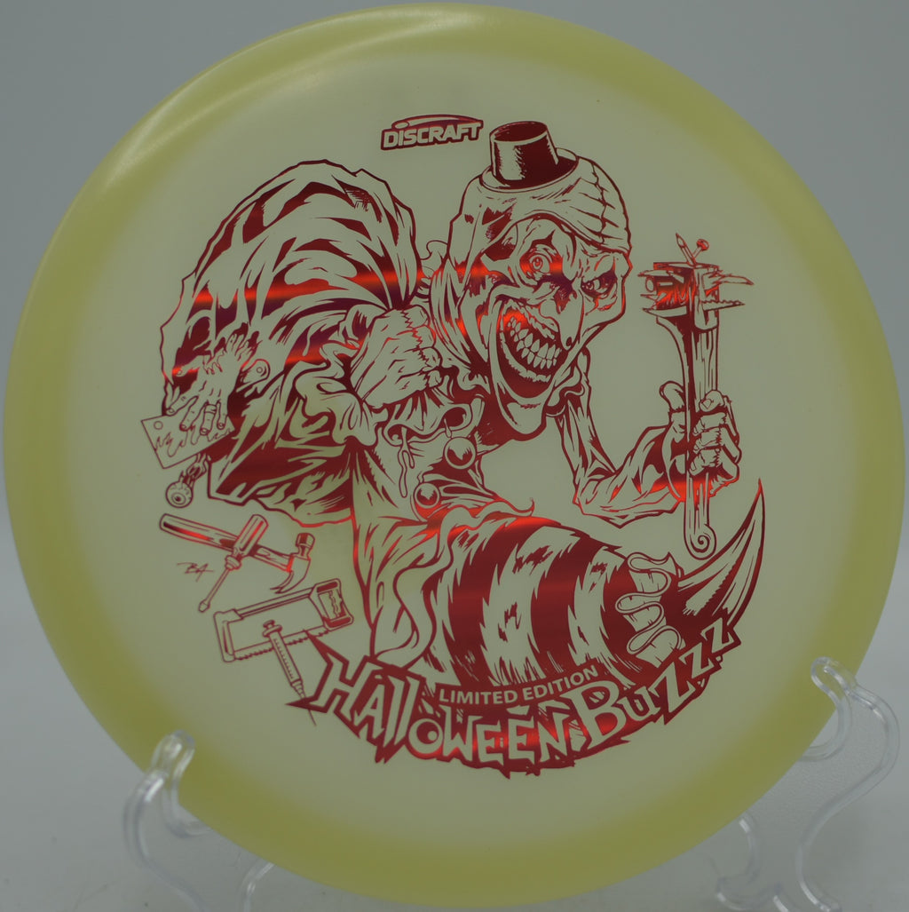 2025 Halloween Single Stamped Mega Glo Buzzz shining during a night round at Milo McIver West Disc Golf Course in Estacada, Oregon.