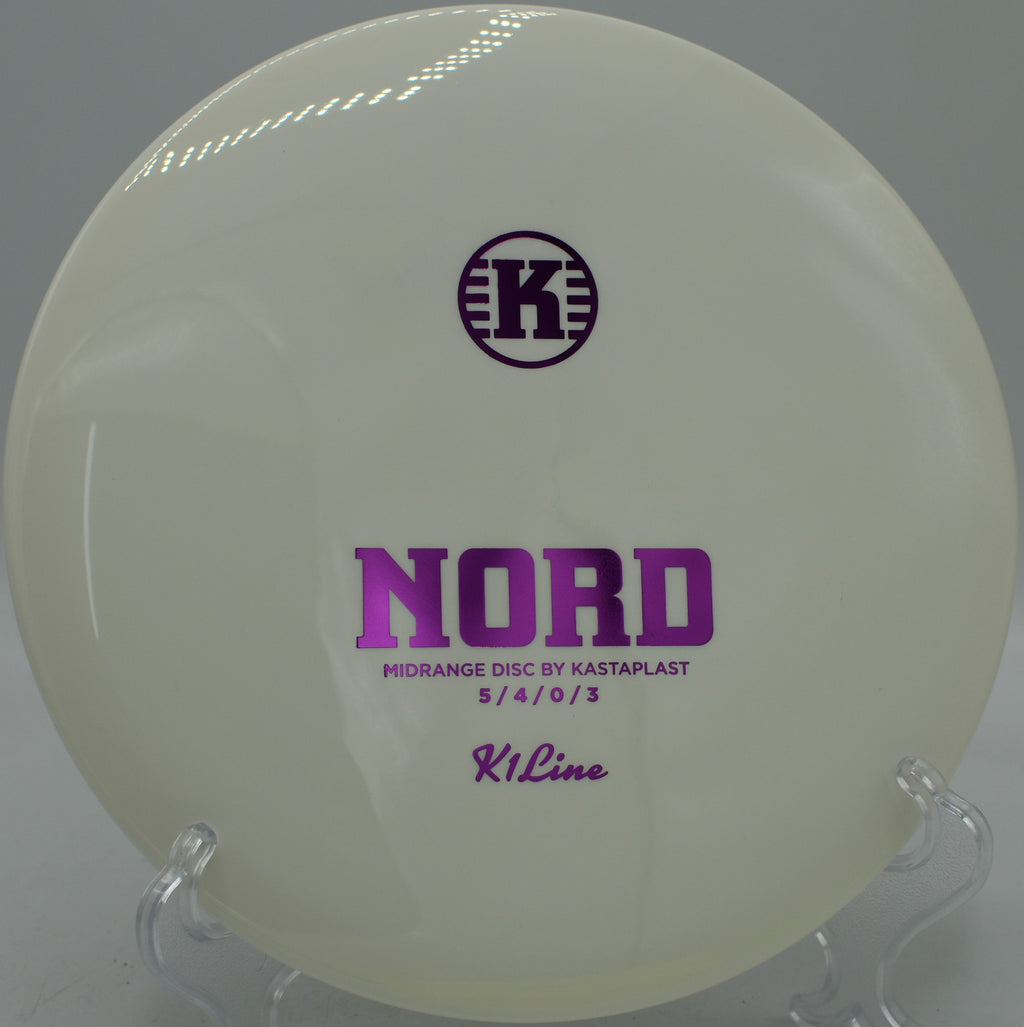 Kastaplast K1 Nord versatile driver carving a controlled hyzer at Hornets Nest Disc Golf Course in Charlotte, North Carolina.