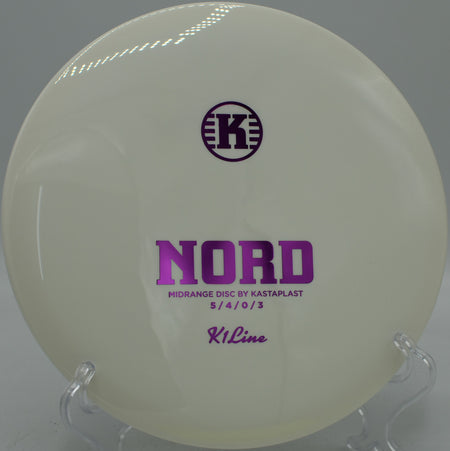 Kastaplast K1 Nord versatile driver carving a controlled hyzer at Hornets Nest Disc Golf Course in Charlotte, North Carolina.