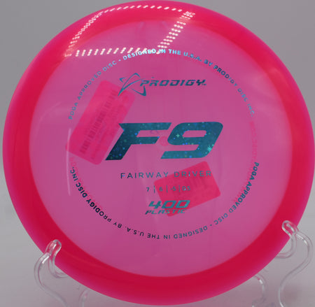 Thrower launching a clean backhand with the Prodigy F9 400 plastic at North Boundary Park Disc Golf Course in Cranberry Township, Pennsylvania.