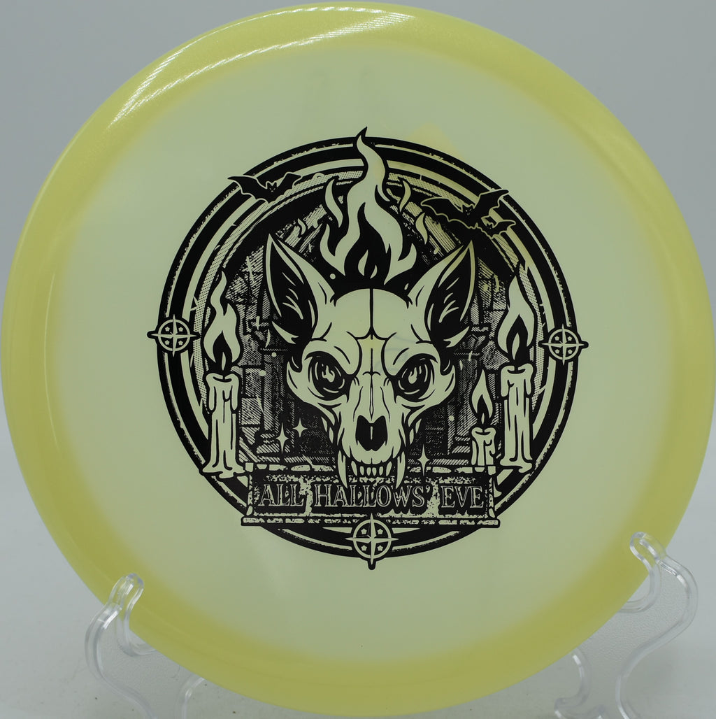 Champion Proto Glow Fox fairway driver flying straight with fade at Winthrop Gold Disc Golf Course in Rock Hill, South Carolina
