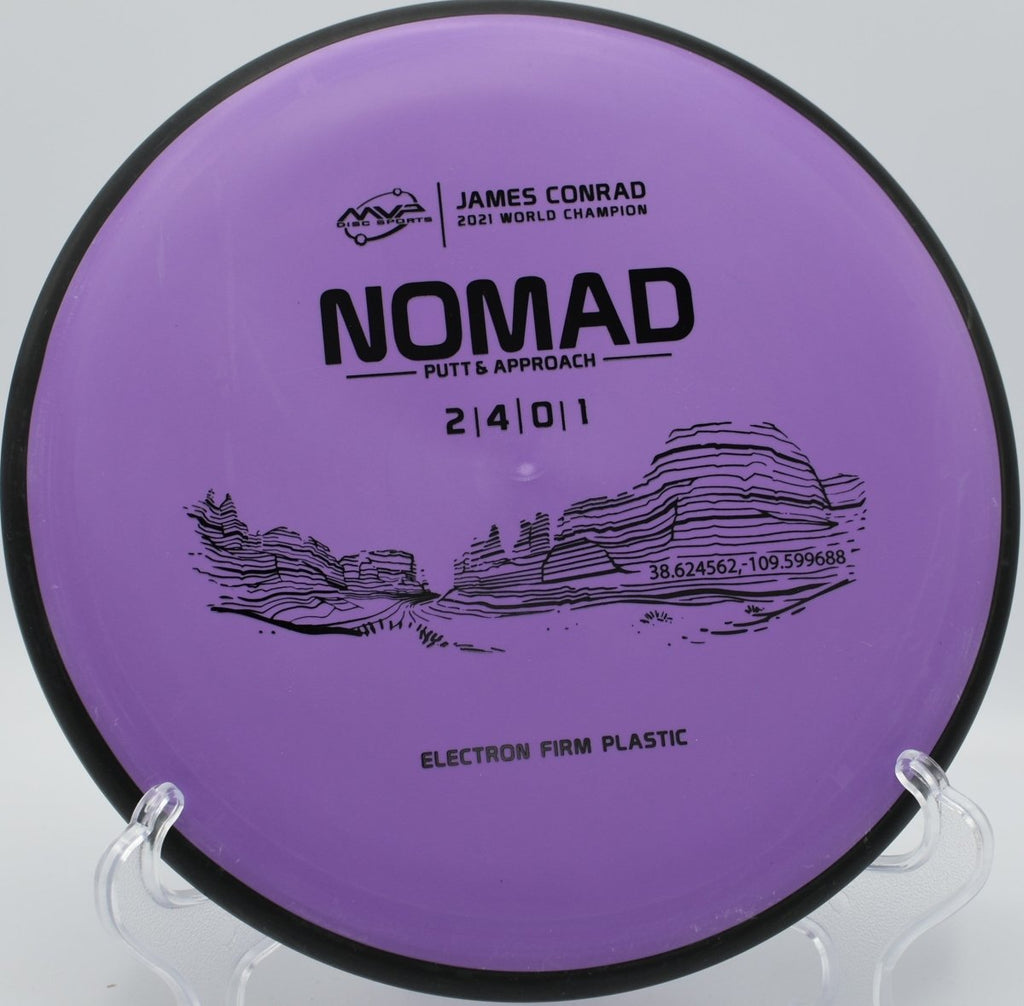 MVP Electron Firm Nomad putter staged for a circle-2 bid at Sims Park Disc Golf Course in Euclid, Ohio