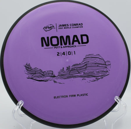 MVP Electron Firm Nomad putter staged for a circle-2 bid at Sims Park Disc Golf Course in Euclid, Ohio
