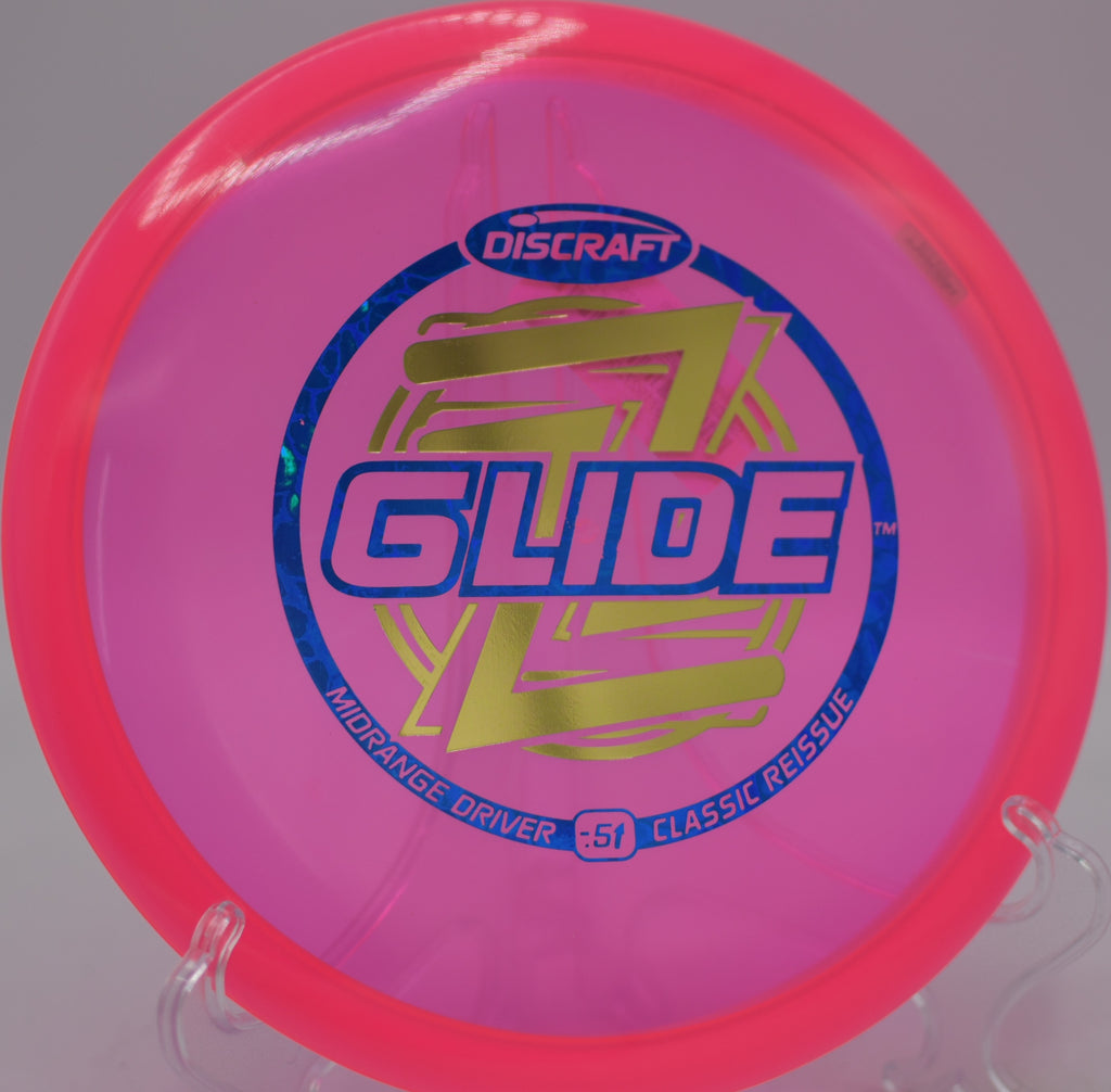 Discraft Z Glide floating straight down a fairway gap at Blue Ribbon Pines Disc Golf Course in East Bethel, Minnesota.
