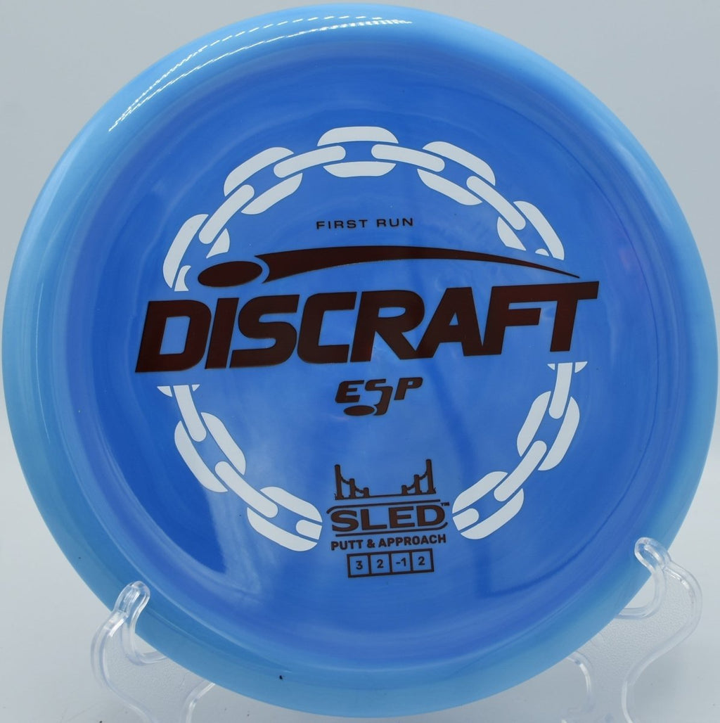 First Run ESP Sled stable putter approach sliding near pin at Trophy Club Disc Golf Course in Trophy Club, Texas