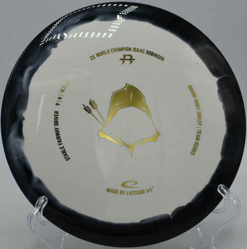 Grand Orbit Sweep Latitude 64° Isaac Robinson 2025 driver holding a clean release at Sabattus Disc Golf Course in Sabattus, Maine.