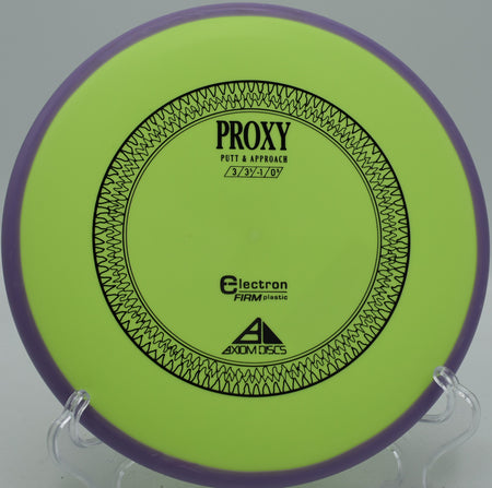 Axiom Electron Firm Proxy straight-flying putter sinking a clean putt at Maple Hill Disc Golf Course in Leicester, Massachusetts.