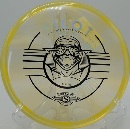 Streamline Proton Pilot driving off the tee on a technical wooded fairway at Bracketts Bluff Disc Golf Course in Huntersville, North Carolina.