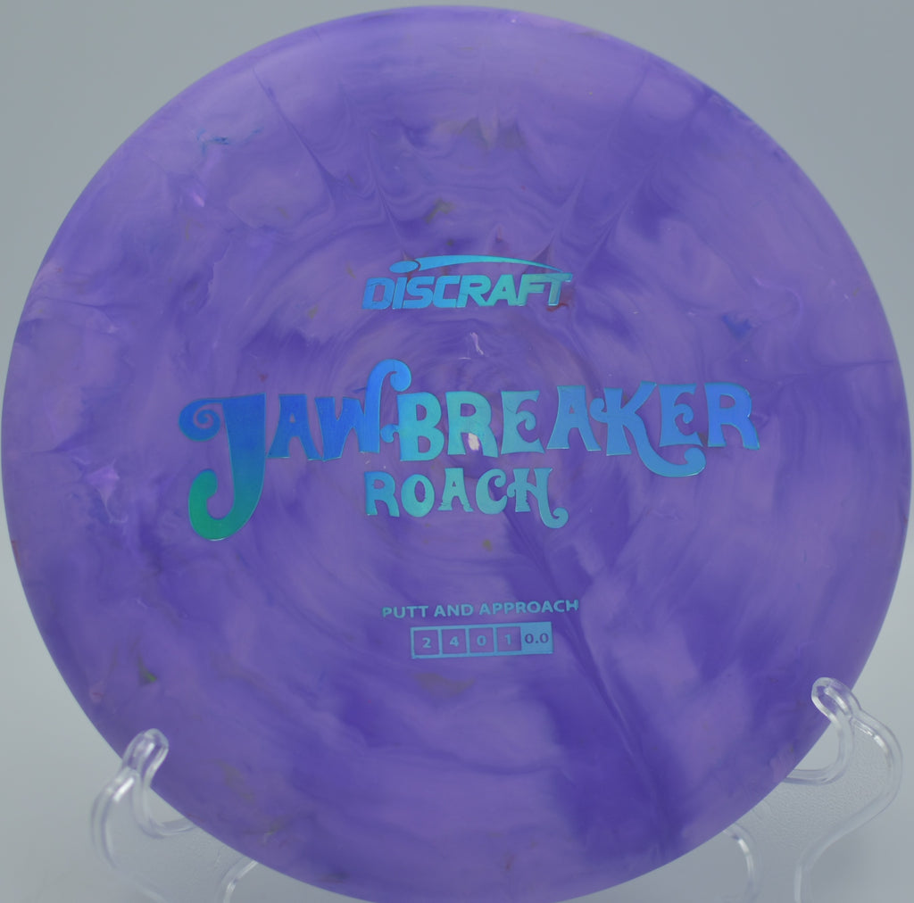 Discraft Jawbreaker Roach smashing a clean backhand approach at Rolling Hills DGC in Ypsilanti, MI, settling flat with minimal ground play.