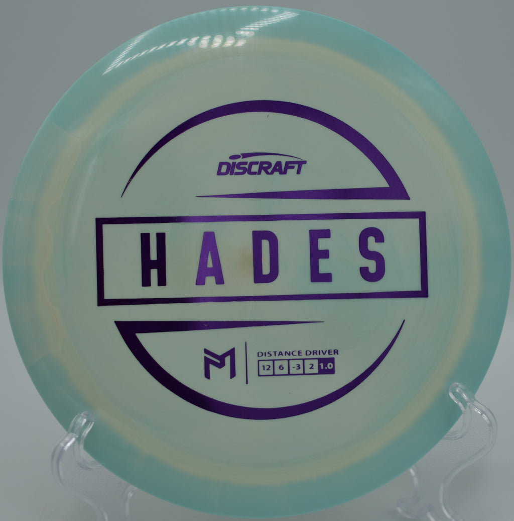 ESP Hades carving a long S-curve over rocky terrain at Carson Ridge Disc Golf Course in Carson City, Nevada.