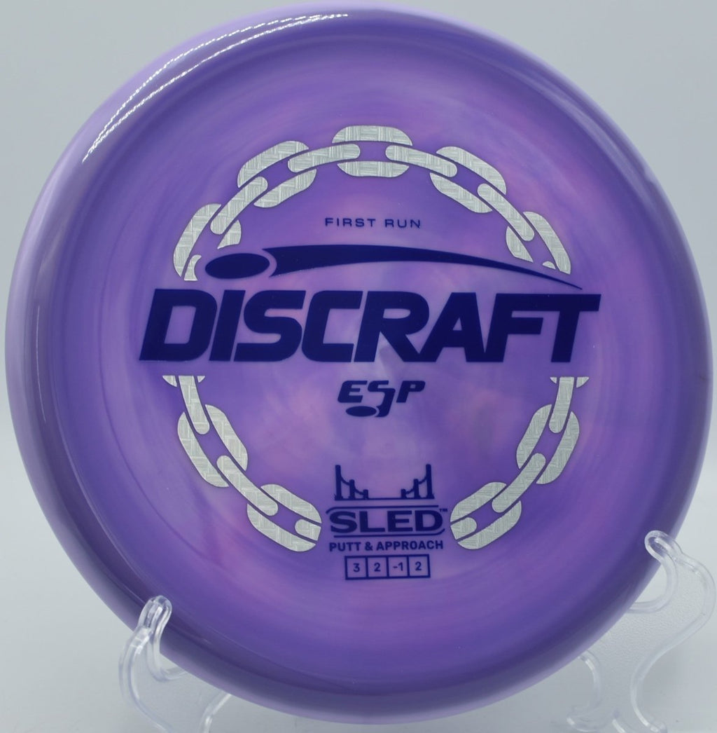 First Run ESP Sled glidey putter upshot near basket at Heritage Farm Disc Golf Course in Adrian, Michigan