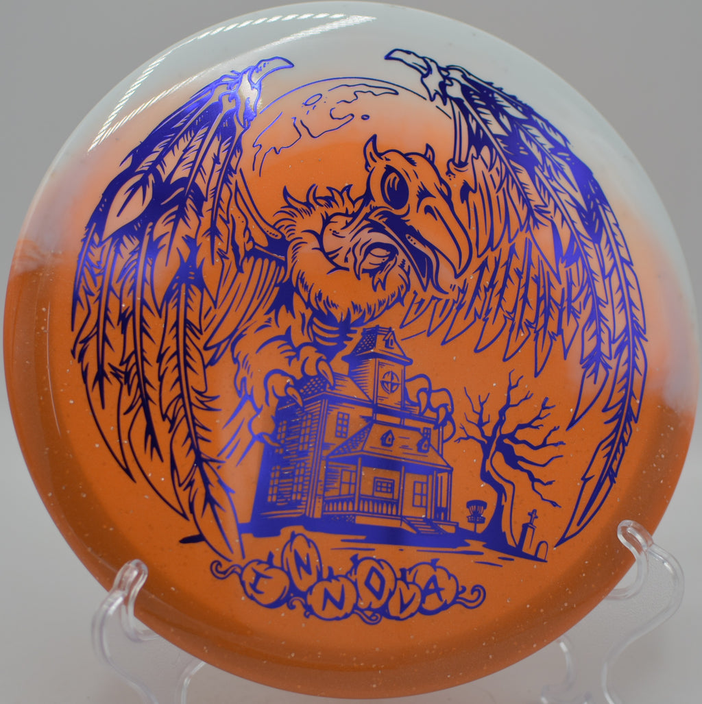 Innova Halloween Duo Roc3 shaping a turnover approach at Iron Hill Disc Golf Course in Newark, Delaware.