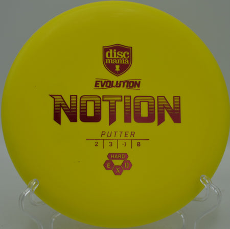 Discmania Exo Hard Notion flying clean and stable toward the basket at Hornets Nest Disc Golf Course in Charlotte, North Carolina.